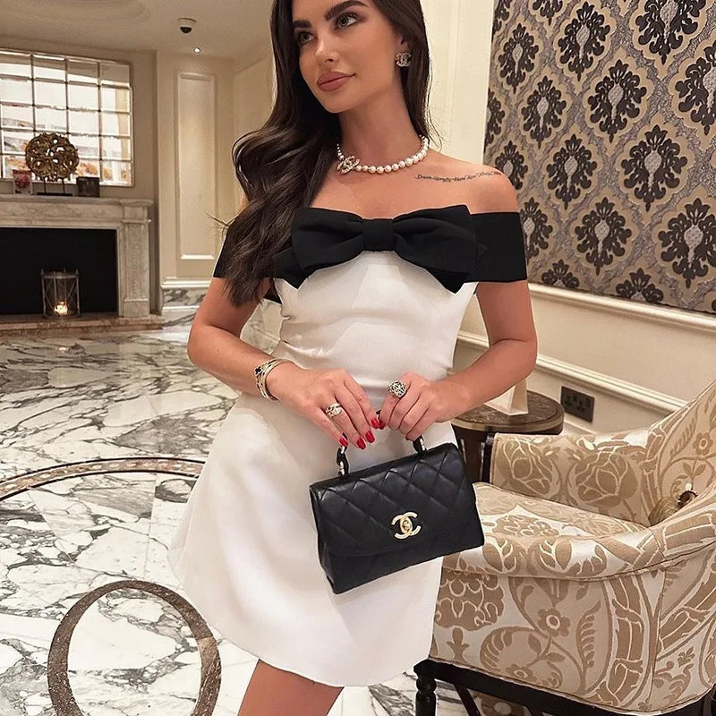 Women's Off-Shoulder Mini Dress - Bodycon Fit - Large Bow Detail - Elegant Party Wear by Lumina Vancouver